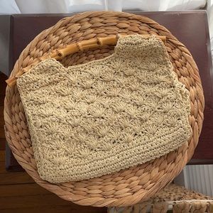 Bamboo-handle knit clutch